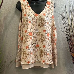 #82 EST. 1946 sleeveless, v-neck, high low chiffon top size large.